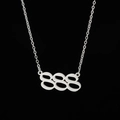 Macro view of silver stainless steel 888 angel number pendant with fine chain - 888 Steel
