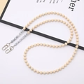 Detail of beige wooden beads and marble textured accents with silver lobster clasps - White Turquoise Natural Stone