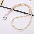 Detail of beaded crossbody strap with natural wood beads and macaron color accents - Jelly Color Natural Stone