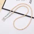 Detail of wooden beads and green natural stone strap with silver metal lobster clasps - Amazonite Natural Stone