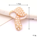 Detail view of pearl mushroom charm with 1.9cm x 2.5cm dimensions and 4.6g weight - Pearl Mushroom