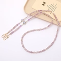 Detalle de cuentas de mármol lila y dijes de estrellas doradas en cadena de bandolera - Cadena Cruzada Estrella / Vidrio Violeta Lavanda Cuentas