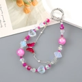 Detailed view of beaded heart and butterfly charm with pink beads and silver metal clasp - Rose Red