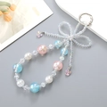 Starry beaded phone strap with crystal bow and heart charm on silver ring hook - Colorful