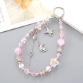 Pink beaded phone wrist strap with crystal stars moon charms and silver metal ring - Pink