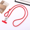 Detail of red nylon braided crossbody phone lanyard with sparkling rhinestone ring - Red