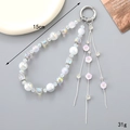 Elegante portachiavi di perle con fiori rosa e nappe in metallo per borse e telefoni - Bianco