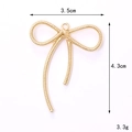 Minimalist golden hollow bow metal pendant with spiral texture, 3.5cm wide and 4.3cm high - Gold (D3109) / Hollow Ribbon Bow / Gold