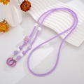 Dettaglio del cinturino per cellulare in perline viola con ciondolo a pecora - Viola