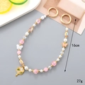 Catena per borsa con perline stile bambù, ciondoli rosa e ganci dorati, 16cm di lunghezza - Catena a mano / Catena a Mano con Ciondolo a Ventaglio Rotondo