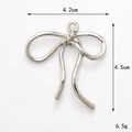 Polished silver ribbon bow pendant with product dimensions 4.2cm by 4.5cm and 6.5g weight - Silver (D3117)