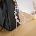 Colorful crystal beaded wrist lanyard with metal butterfly charm on black leather bag - Pink