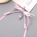 Pink ribbon bow keychain with pearls and heart crystal charm for bags and phones - Pink