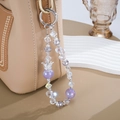 Luxury crown crystal beaded phone strap with purple pearls and silver ring clasp - Purple