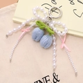 Ciondolo tulipano fatto a mano in maglia con fiocco di perle e fiori blu all'uncinetto - Blu