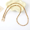 Colorful woven handbag strap with gold lobster clasps displayed on a ceramic tray - Crossbody Chain (K5025)