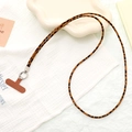 Detailed view of leopard print leather phone lanyard with metal ring and T-shaped patch - Crossbody Chain (K5103)