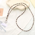 Detail of leopard print fabric phone strap with silver metal ring and T-shaped connector - Crossbody Chain (K5099)