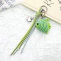 Handmade crochet fish keychain with heart charm and blue-green tassels for bags - Green Fish Style (K5134)
