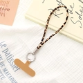Detail of leopard print phone lanyard with metal ring and brown connector pad on soft fabric - Wrist Charm (K5095) / Khaki