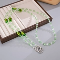 Cordino per cellulare con perline di fiori verdi e anelli a molla per borse e zaini - Verde / K5146