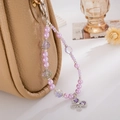 Eleganter violetter Perlen-Handy-Anhänger mit silbernem Schmetterling an einer Tasche - Lila Schmetterling Anhänger (K5112)