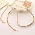 Detail of adjustable beige leather and gold chain strap with lobster clasps for bags - Beige Apricot