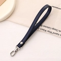 Close-up of deep blue leather wrist strap with silver swivel lobster clasp and neat stitching - Cross Pattern Leather Hanger / Navy Blue