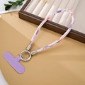 Detail of woven phone wrist strap with silver connector and purple gasket on leather - Phone Strap / Purple (K5220)