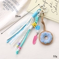 Dettaglio ciondolo per borsa a ciambella con fiocco e perline su gancio a cuore - Ornamento Ciambella / Stile Blu (K5279)
