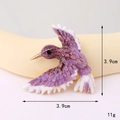 Macro shot of 3.9cm hummingbird charm with purple glitter finish and alloy base - Gold Base Purple Hummingbird