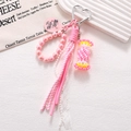 Pink handmade acrylic candy phone charm with lace, woven tassel and metal heart clip - Charm / Pink