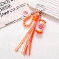 Handmade woven acrylic candy phone charm with beads, ribbons and good luck tag charm - Charm / Orange