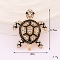 Spilla tartaruga scintillante in lega di zinco con strass in cristallo (3,6x3 cm) - Base Oro Tartaruga Strass Nero (D3292)