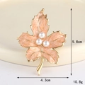 Close-up of maple leaf alloy pendant with pink marble enamel and white pearls - Enamel Pearl Maple Leaf (Gold Pink) (D3332)
