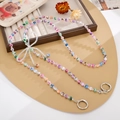 Cordino per telefono alla moda con perle di vetro colorate e ciondolo a fiocco - Fiocco Multicolore (K5496)
