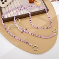 Cordoncino per telefono con perle viola marmorizzate e fiocco di cristallo - Fiocco Viola (K5495)