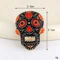 Detail of Day of the Dead enamel skull pin showing dimensions 2.3cm by 3.1cm - Gold Black Enamel Sugar Skull (D3315)