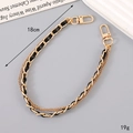 Detail of 18cm gold chain and black leather woven strap with dual metal lobster clasps - Double Chain Leather Woven Handle Black (K5500)