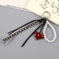Charm per borsa retrò in corda di pelle intrecciata con cuore e nastro in pizzo floreale - Ciondolo a Cuore in Corda Intrecciata di Pelle (K5556) / Borgogna