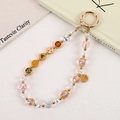 Perlen-Handykette im chinesischen Stil mit Emaille-Anhängern und Fu-Glückssymbol - Rosa