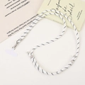 Detail of durable black and white braided crossbody phone lanyard with silver metal hook - Crossbody Chain / White (K5529)