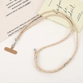 Detail of hand-woven beige crossbody phone lanyard with silver metal adjustment buckle - Crossbody Chain / Khaki (K5530)