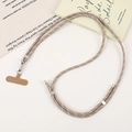 Close-up of adjustable woven phone strap with silver swivel hook and brown cord - Crossbody Chain / Light Coffee (K5534)
