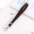 Brown PU leather wrist strap for phone with silver metal lobster clasp and 19cm length - Cross Pattern Leather Hanger / Dark Coffee