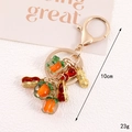 Détail du pendentif kaki et cacahuète dorée de 10cm avec indications de taille et poids - Style Porte-clés Kaki Cacahuète (K5699)