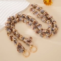 Golden metal chain crossbody strap with multicolored faux fur weaving and round clasps - Brown