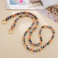 Close-up of rainbow chenille woven metal chain strap with golden spring ring clasps - Crossbody Chain / Colorful