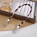 Detail of leopard print plush strap featuring high-gloss silver metal spring hooks - Khaki