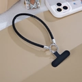 Detail of black snakeskin braided phone lanyard with silver metal clasp and connector - Black